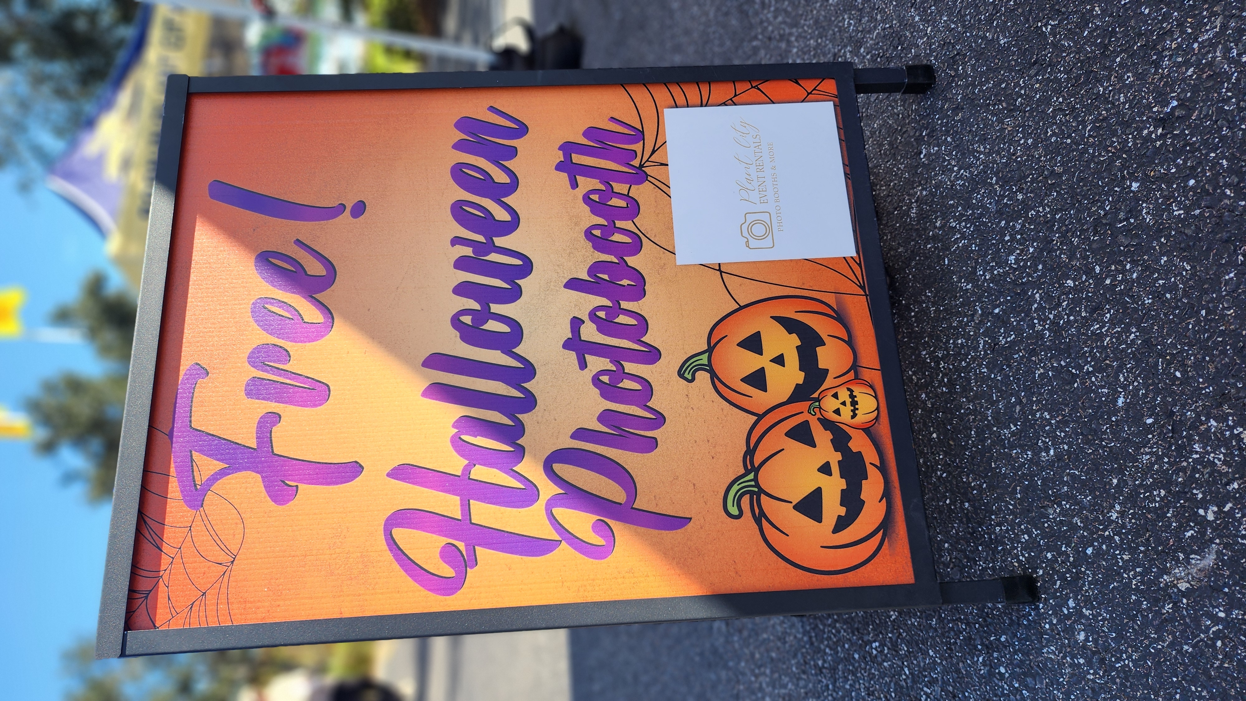 Free Halloween Photo Booth sign displayed at the Dinosaur World event in Plant City, Florida